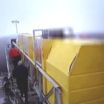 Custom Air Cargo Containers Being Loaded Onto Plane