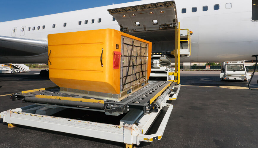 Air Cargo Containers being loaded onto plane