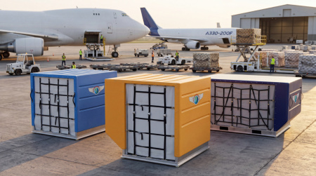 rotomolded air cargo containers on tarmac