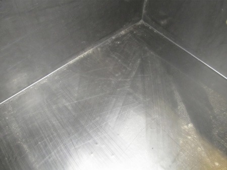 Rotolined Corner of Tank after Holiday Testing