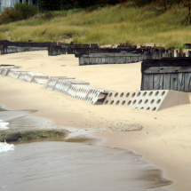 greatlakesinstall18 Sand being built up on both sides of Sandsaver modules on Lake Michigan