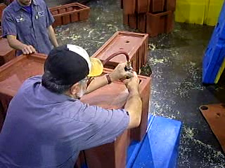 Rotomolded Product being trimmed out